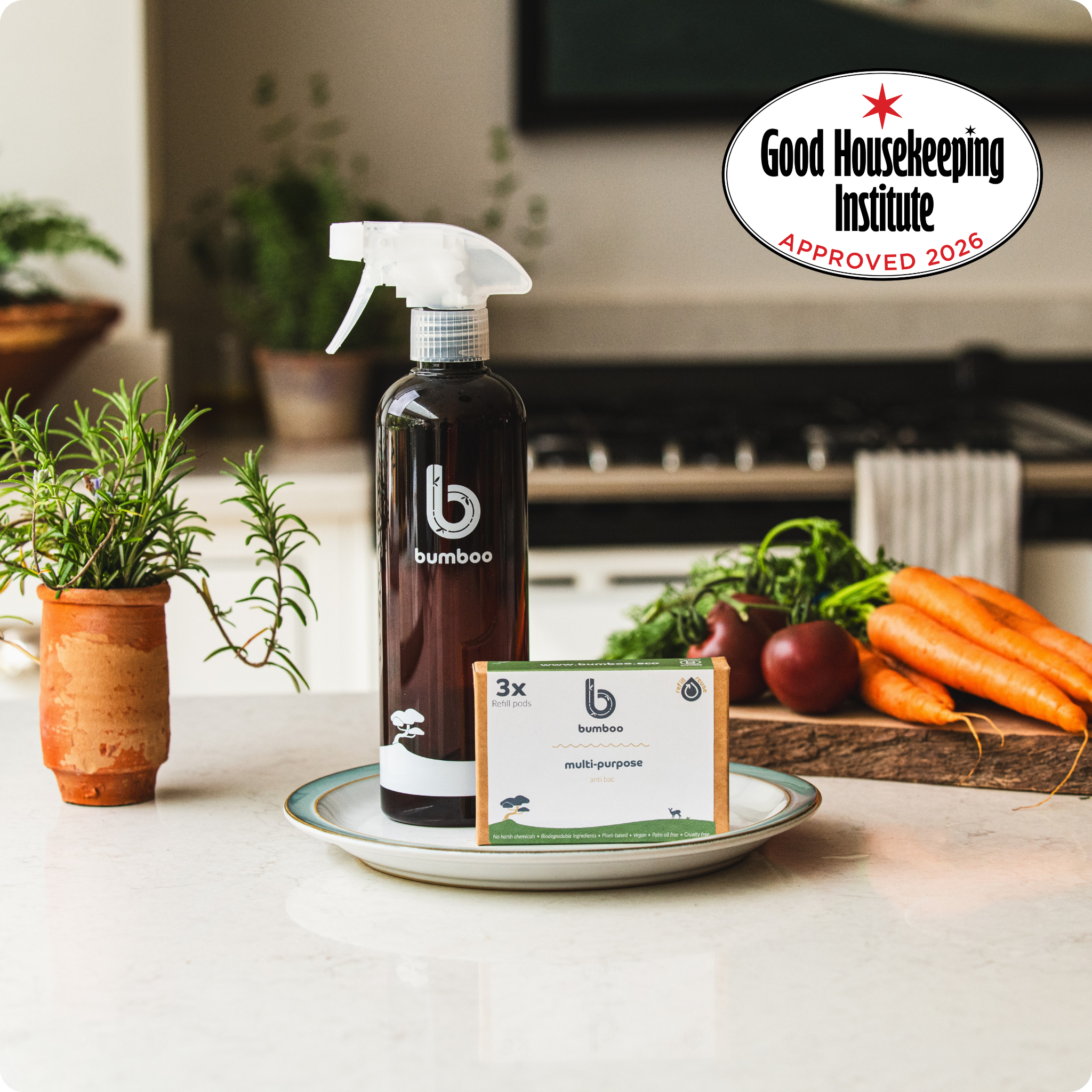 Bamboo cleaning product with packaging on a kitchen counter, Good Housekeeping Institute logo visible