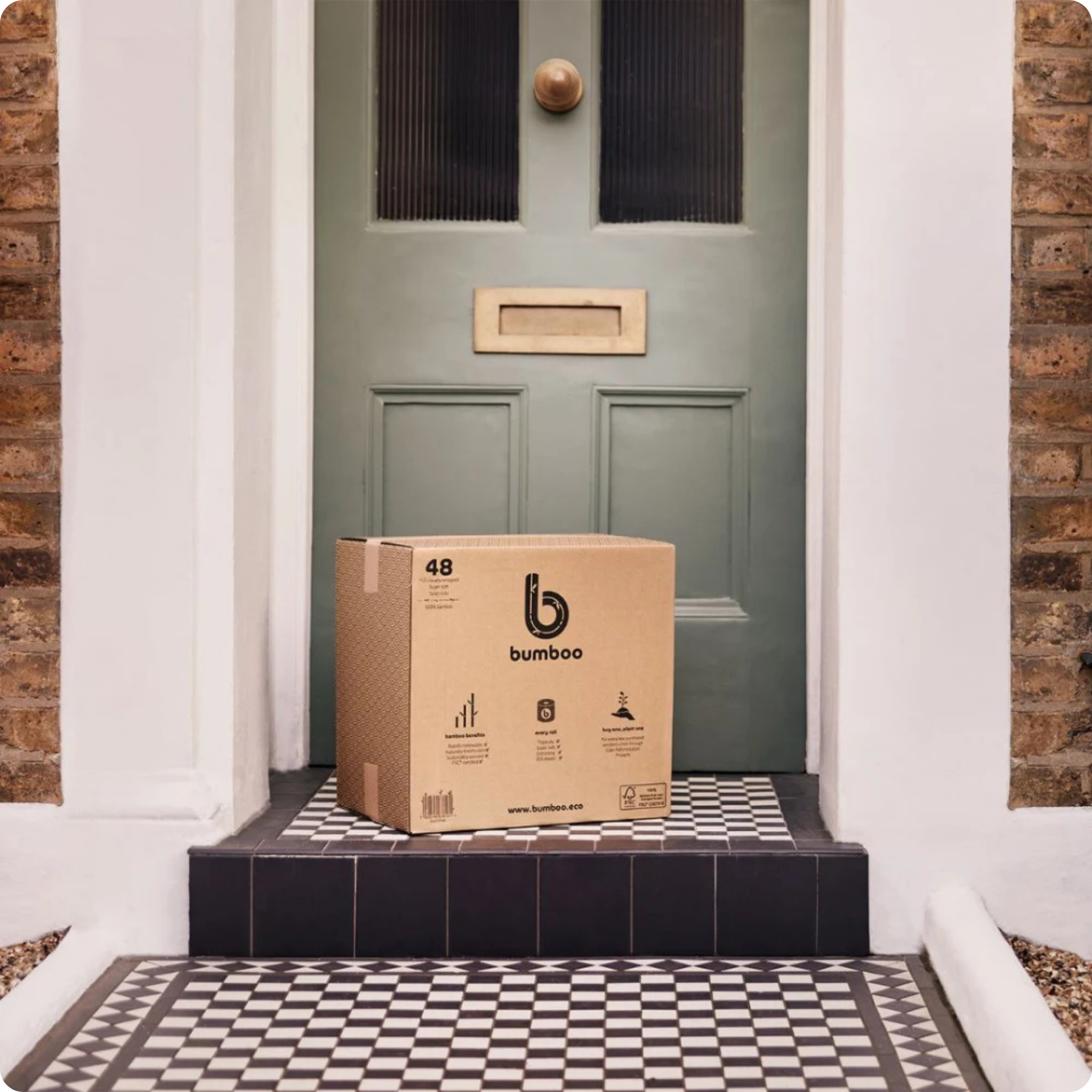 Box of bumboo toilet paper on doorstep