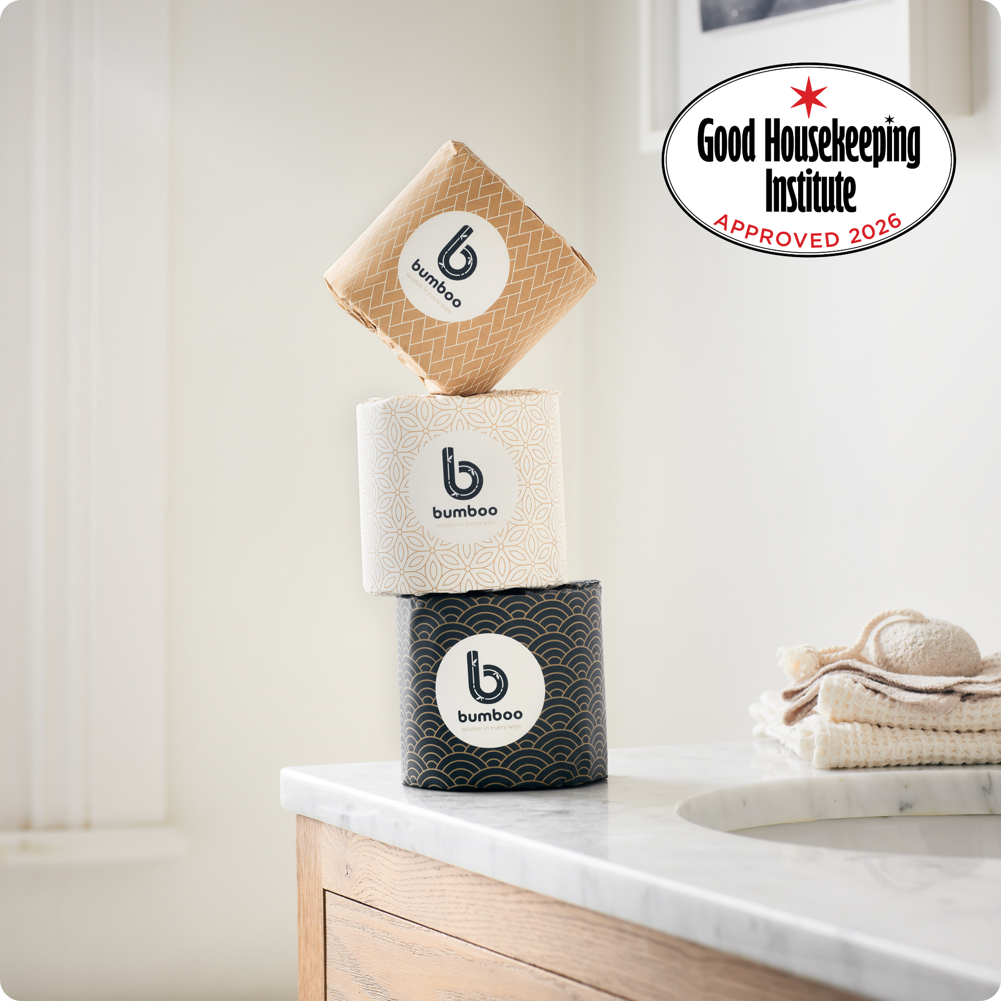 Bamboo products stacked on a bathroom counter with Good Housekeeping Institute approval badge.