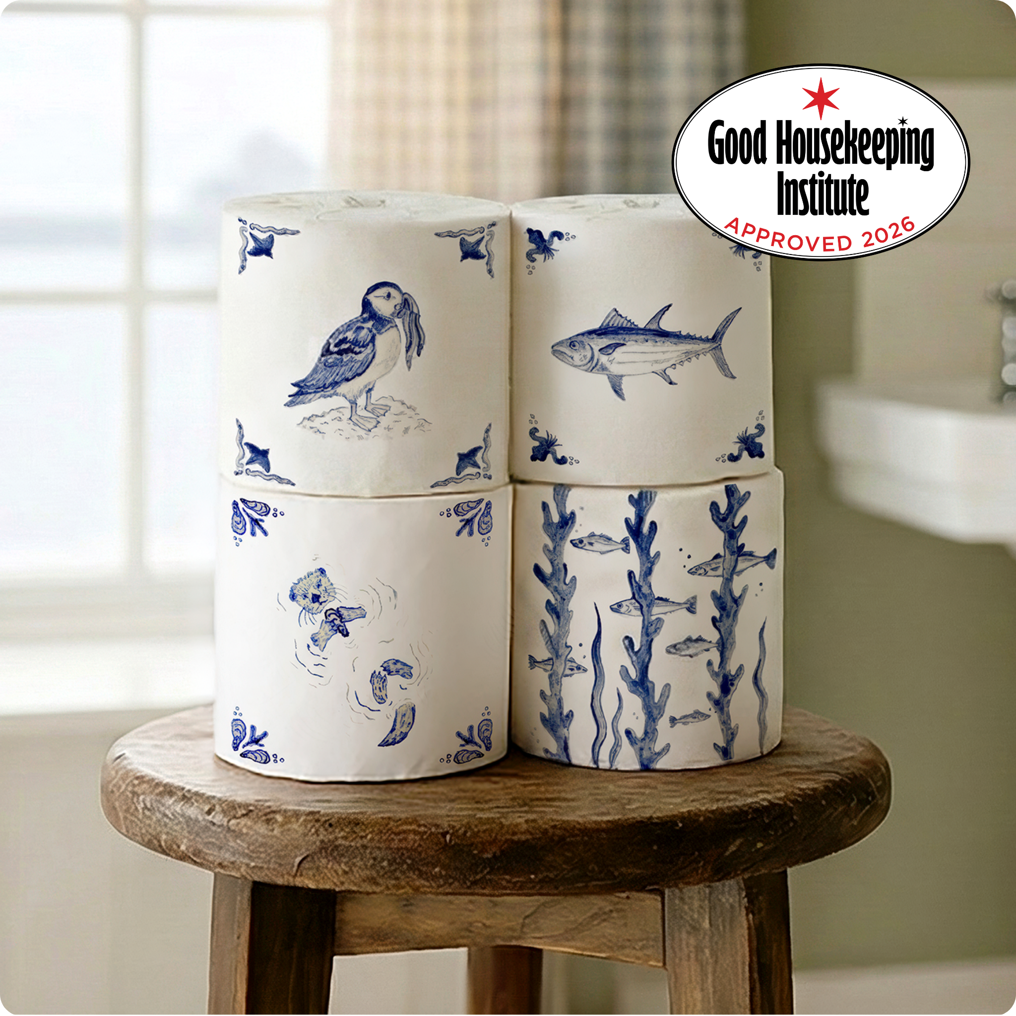 Stack of decorative containers with blue animal illustrations on a wooden stool, Good Housekeeping Institute logo visible.
