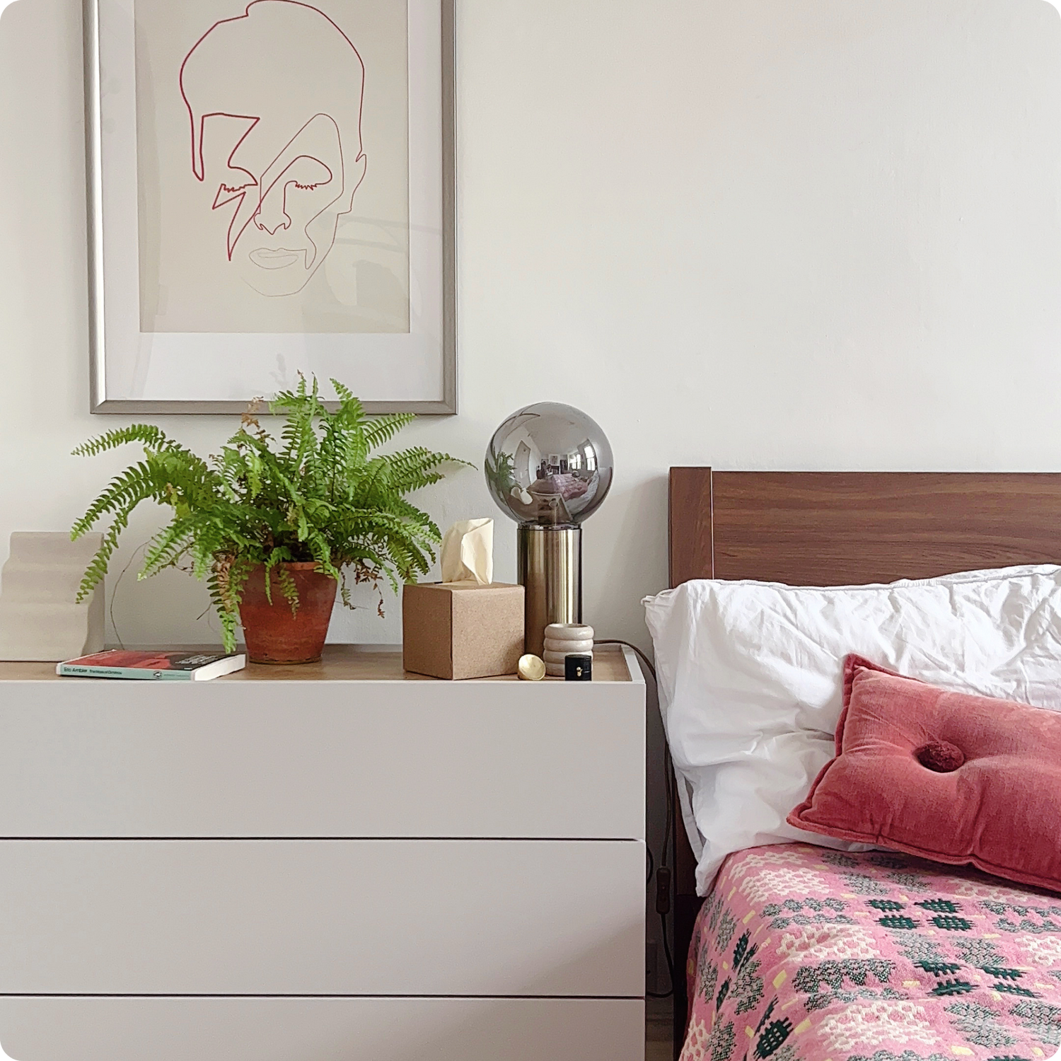 bedroom with facial tissues on bedside table
