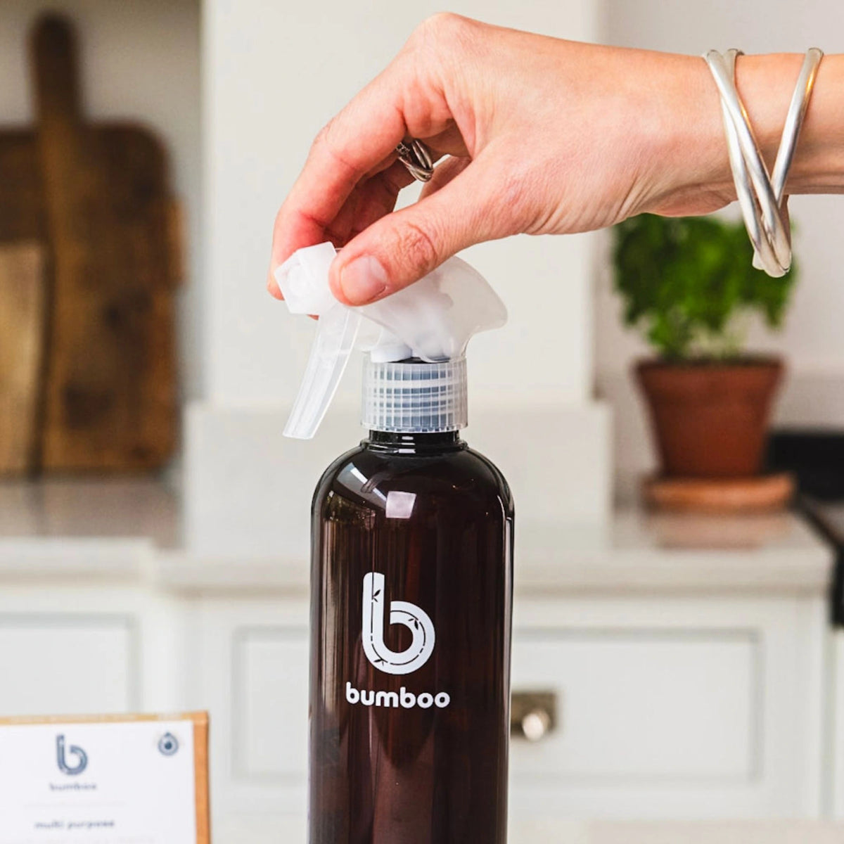 Cleaning spray trigger being added to bottle