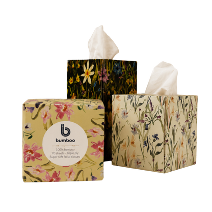 three boxes of facial tissues
