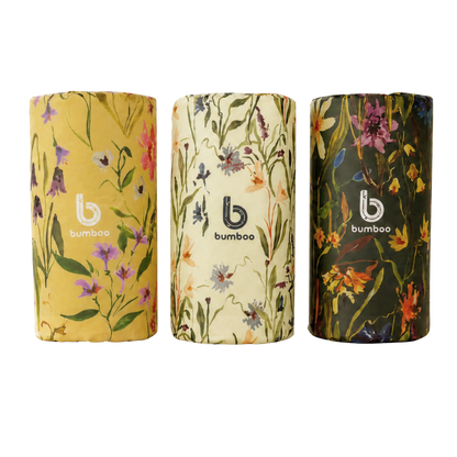 Three kitchen roll with floral designs and &
