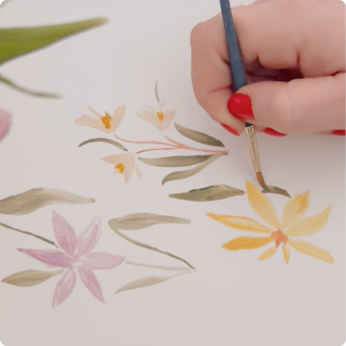 Hand painting wild flowers on canvas