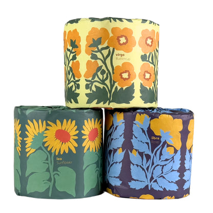 Bamboo toilet paper wrapped in a zodiac flower design