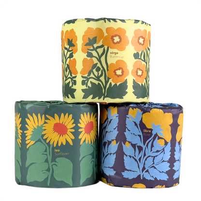 Bamboo toilet paper wrapped in a zodiac flower design