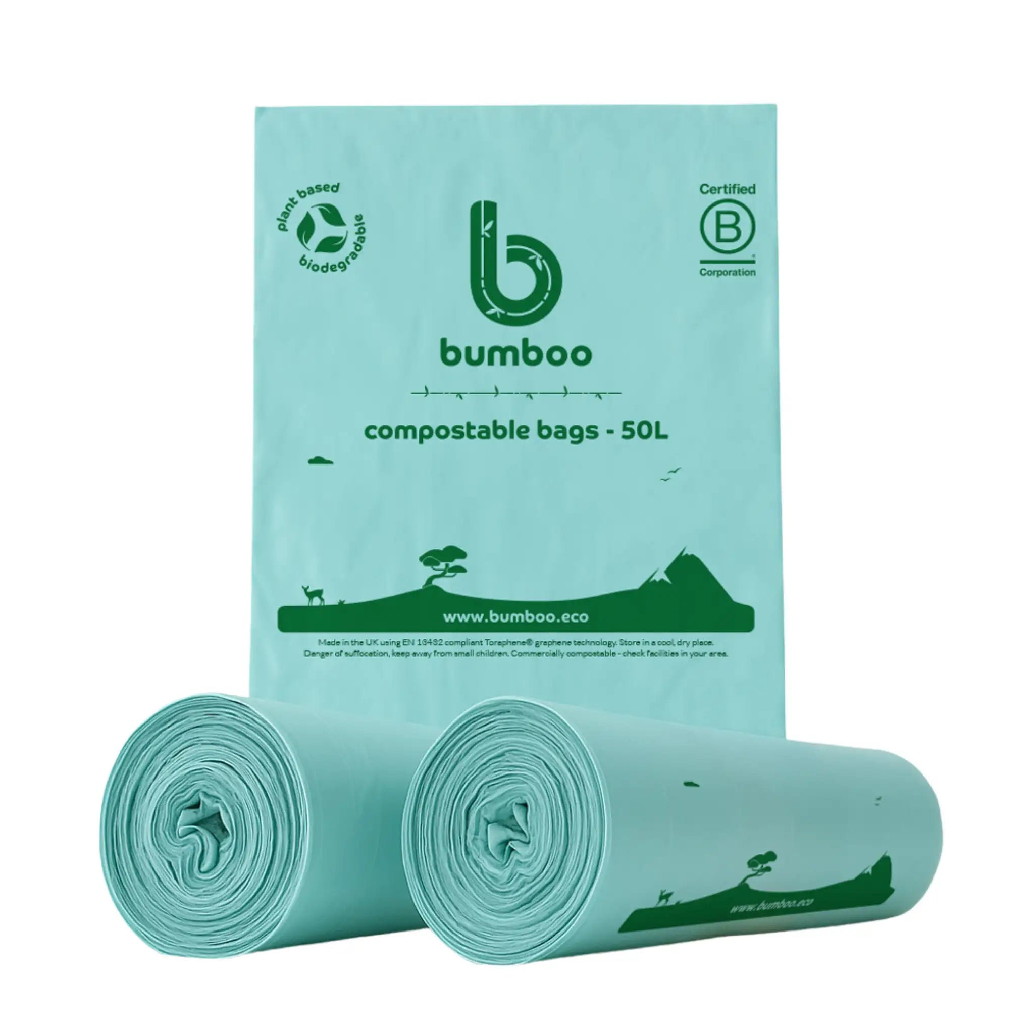 Rolls of green compostable bin bags with Bumboo branding on a white background