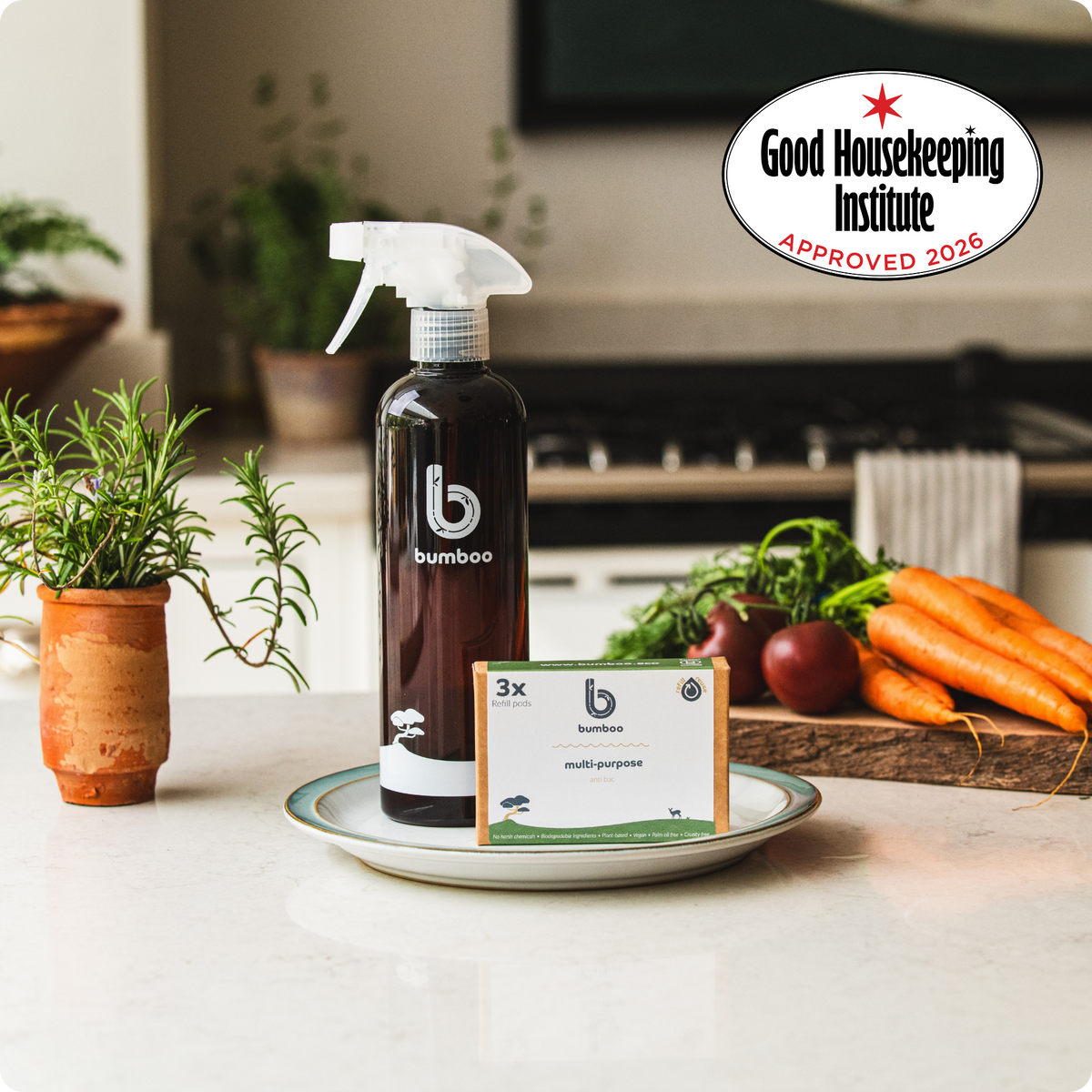Bamboo cleaning product with packaging on a kitchen counter, Good Housekeeping Institute logo visible