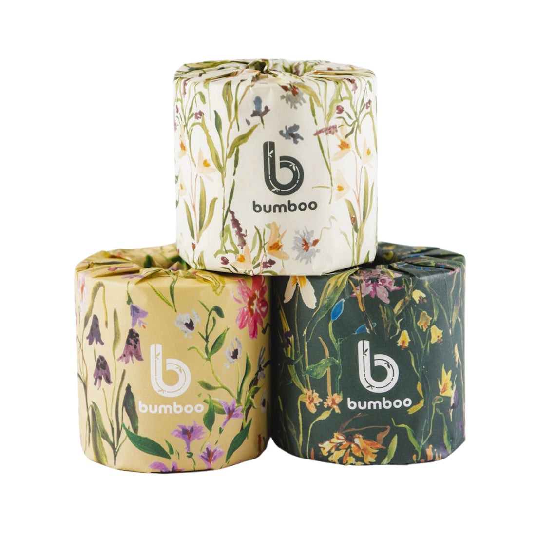 Three rolls of toilet paper with floral patterns and &