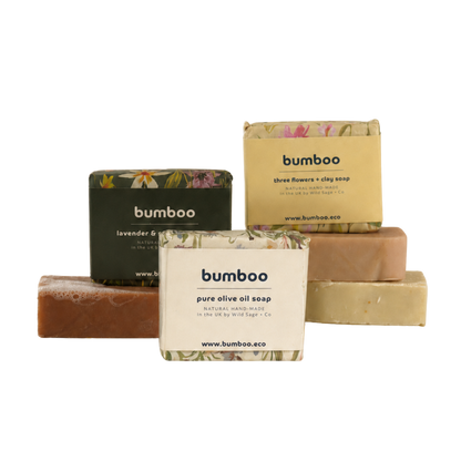Collection of Bumboo soaps and packaging on a white background